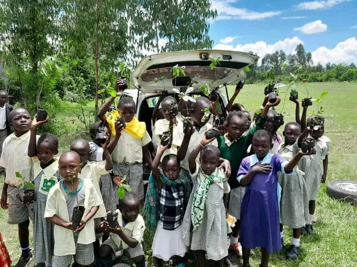 Kenyan children applying modern agricultural techniques learned through Ke Devries Farm training programs
